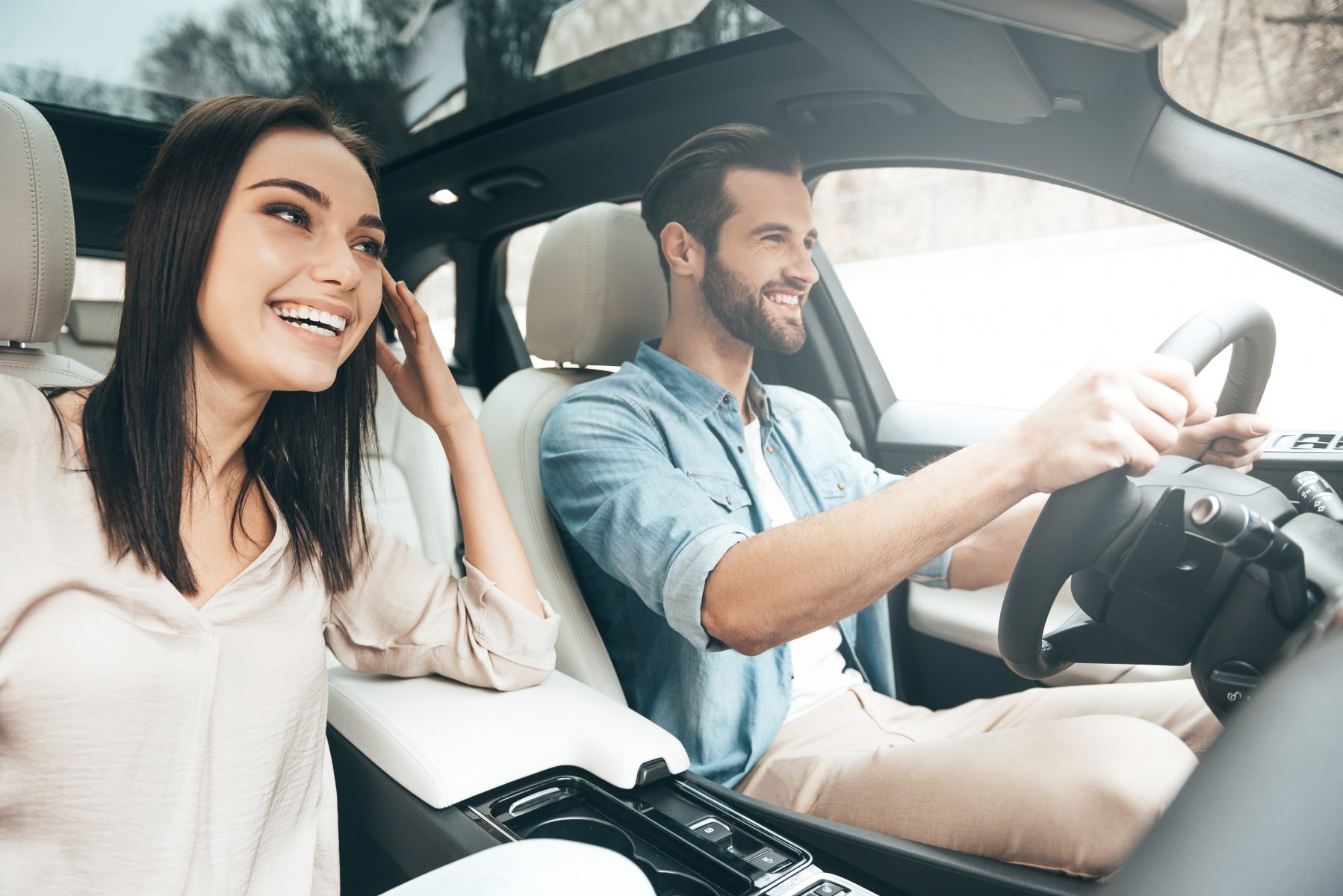 Happy Couple in Rental Car